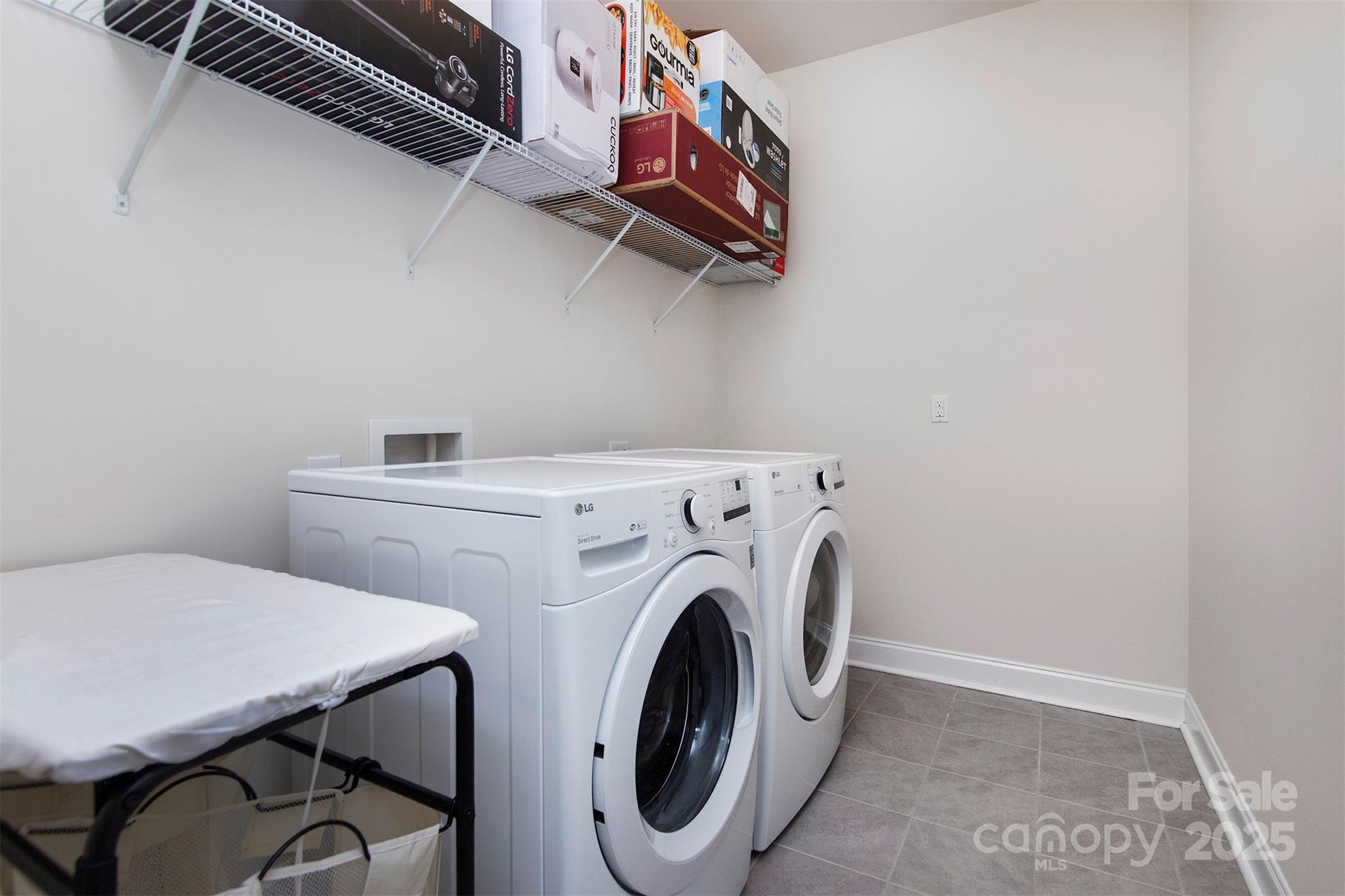 938 Moose Trail Matthews, NC 28104 - Photo 18 of 23 a utility room with dryer and washer