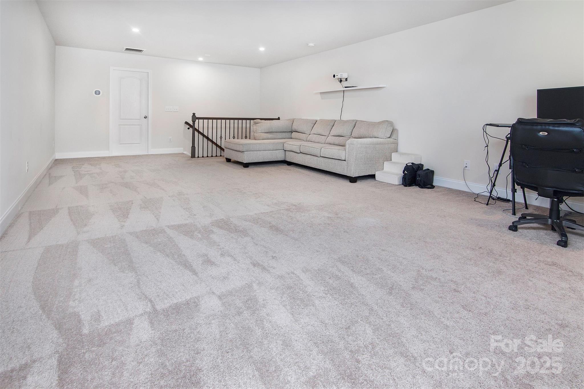 938 Moose Trail Matthews, NC 28104 - Photo 19 of 23 a living room with furniture and a couch