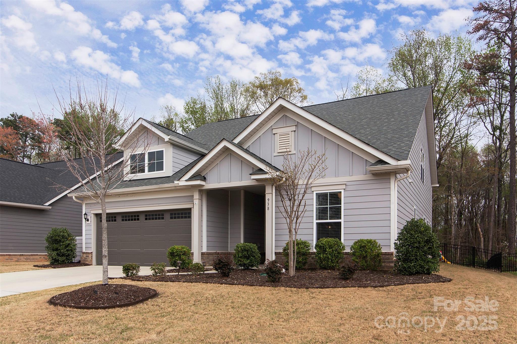 938 Moose Trail Matthews, NC 28104 - Photo 23 of 23 a front view of a house with garden