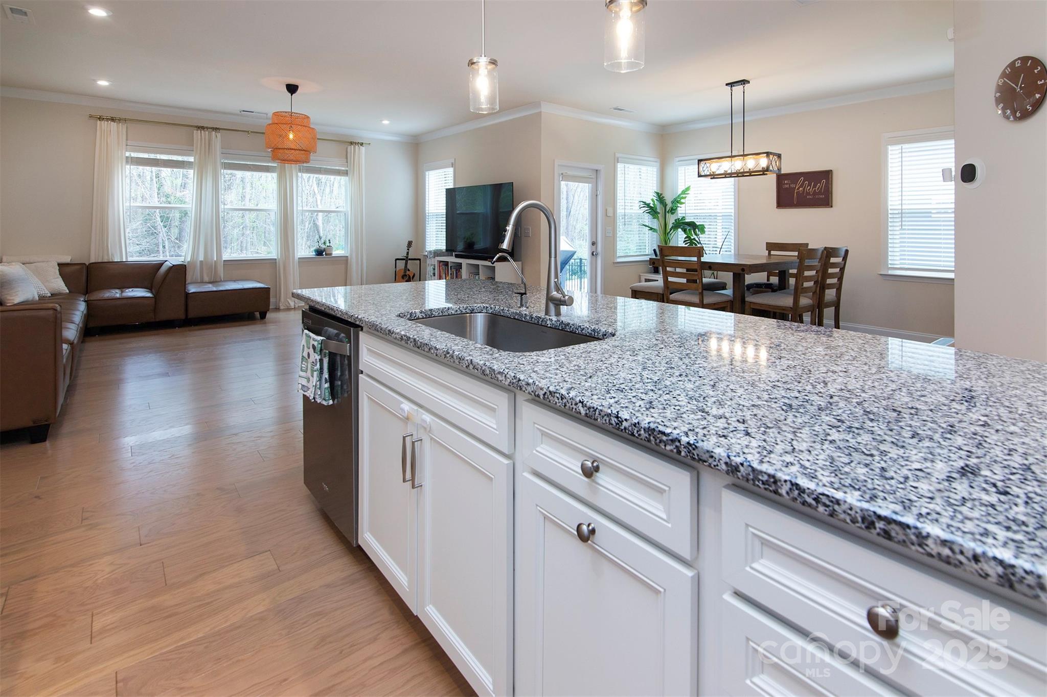 938 Moose Trail Matthews, NC 28104 - Photo 5 of 23 a kitchen with counter top space cabinets and stainless steel appliances