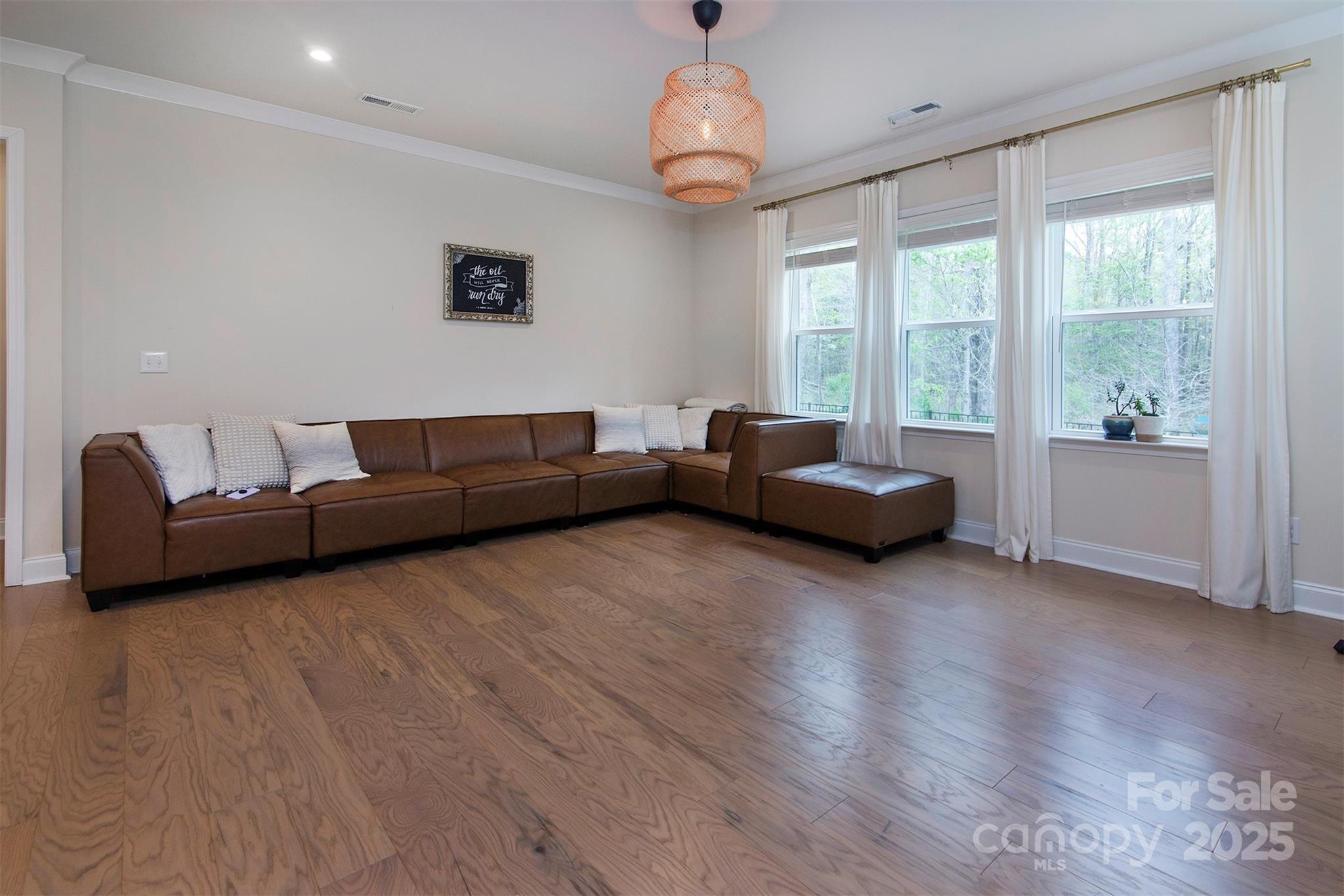 938 Moose Trail Matthews, NC 28104 - Photo 9 of 23 a living room with furniture and a large window