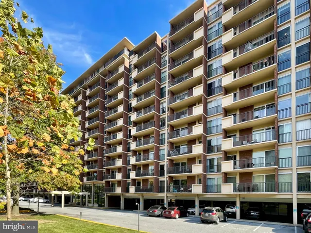 a view of a building with a street