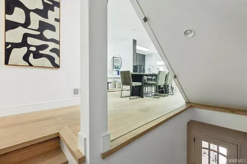 a view of living room with furniture and rug