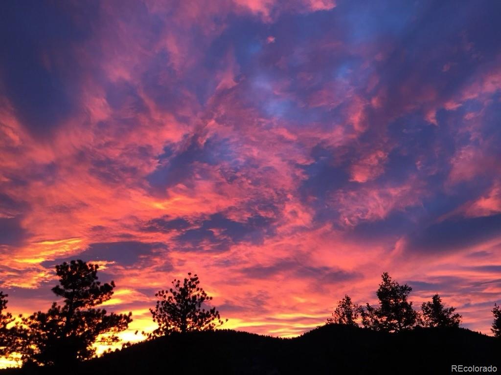 32427 Little Cub Road Evergreen, CO 80439 - Photo 39 of 40 a view of sunset