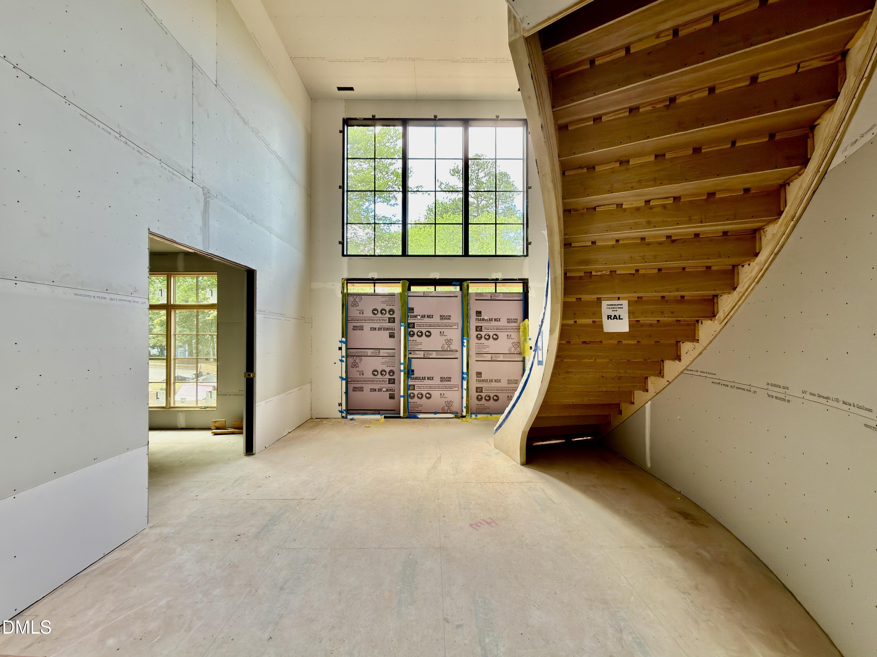 7136 North Ridge Drive Raleigh, NC 27615 - Photo 11 of 68 a view of an empty room with windows
