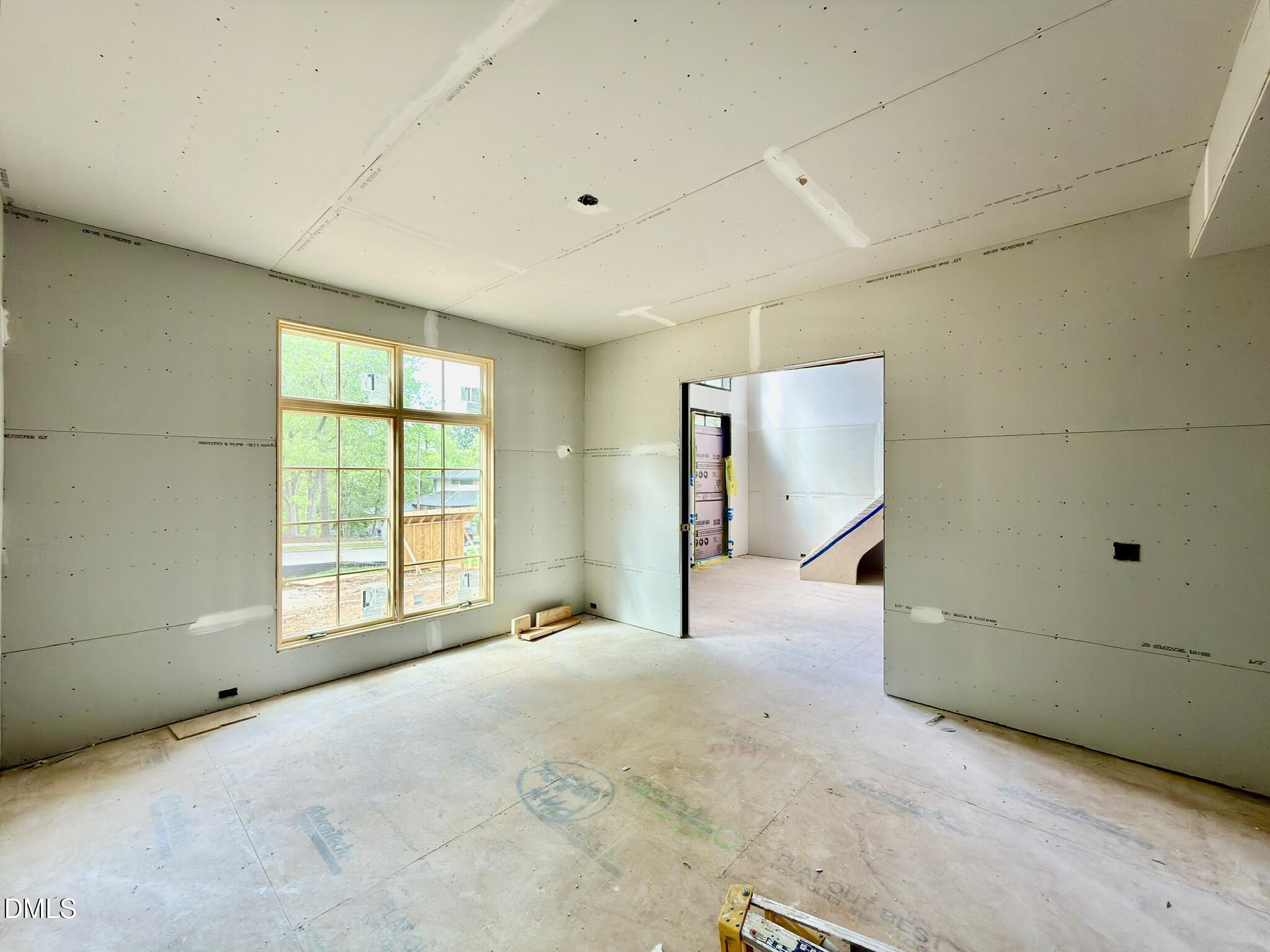 7136 North Ridge Drive Raleigh, NC 27615 - Photo 12 of 68 a view of an empty room with a window