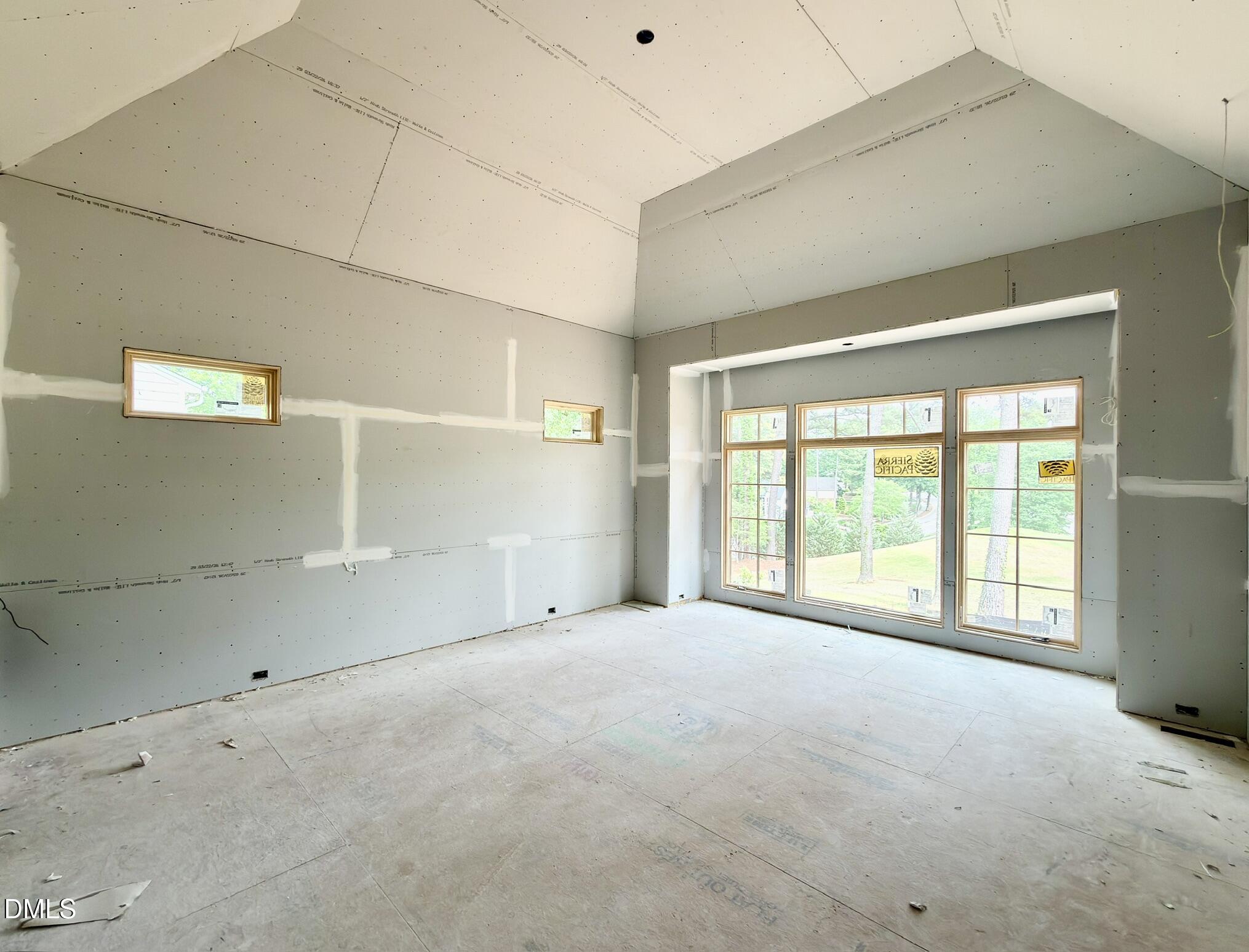 7136 North Ridge Drive Raleigh, NC 27615 - Photo 28 of 68 a view of an empty room with a window