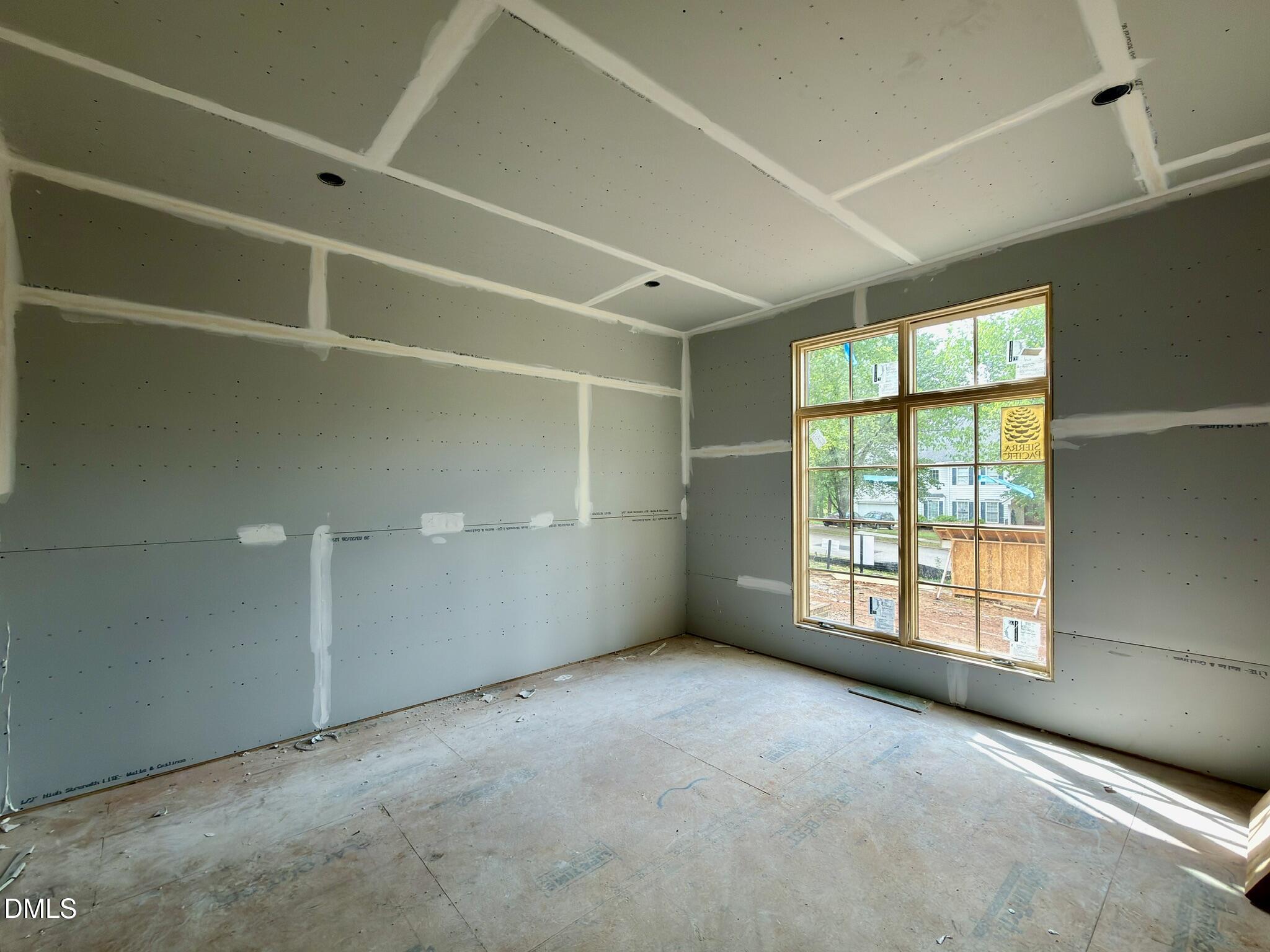 7136 North Ridge Drive Raleigh, NC 27615 - Photo 31 of 68 a view of an empty room with a window