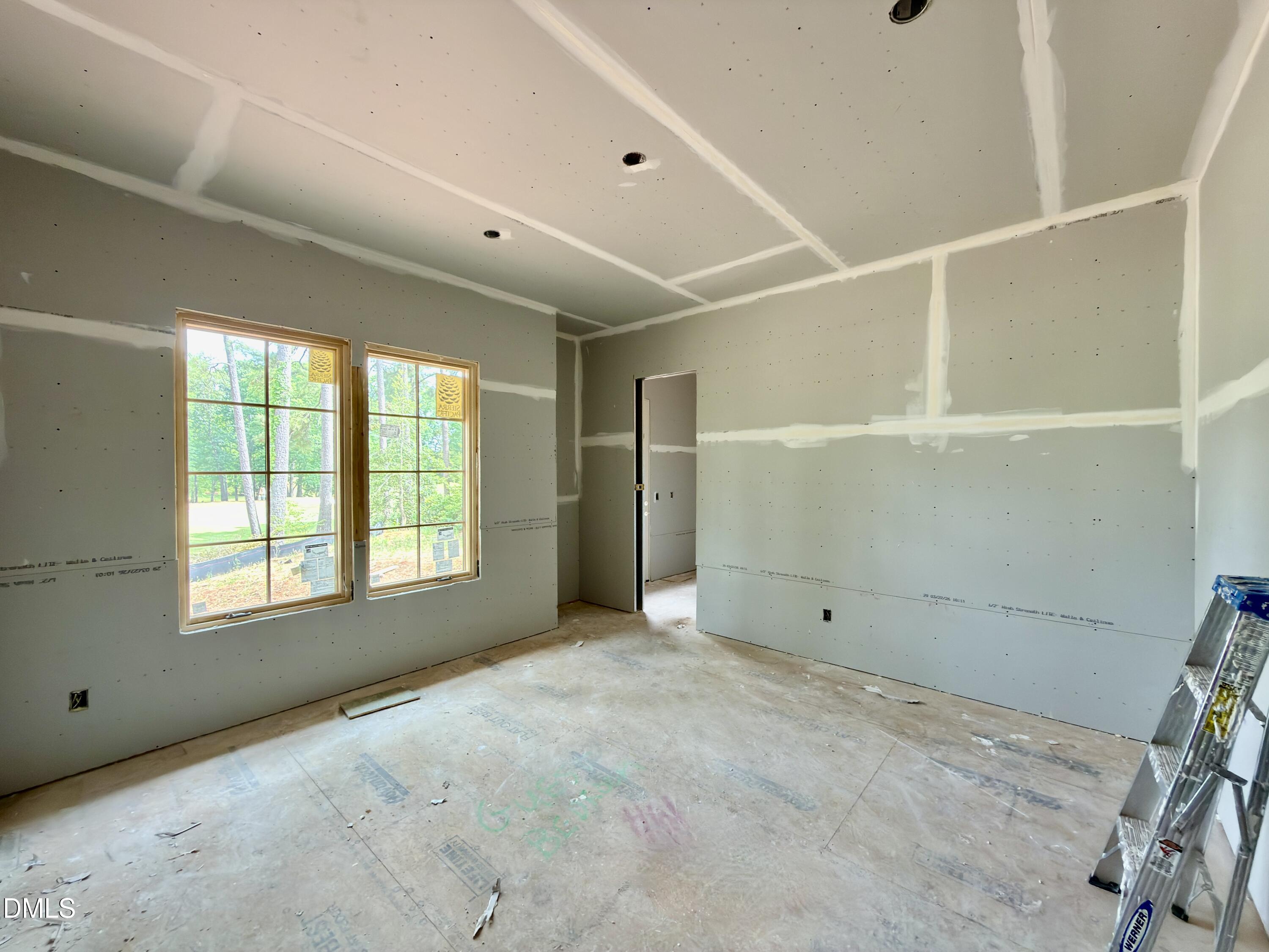 7136 North Ridge Drive Raleigh, NC 27615 - Photo 32 of 68 a view of an empty room with a window