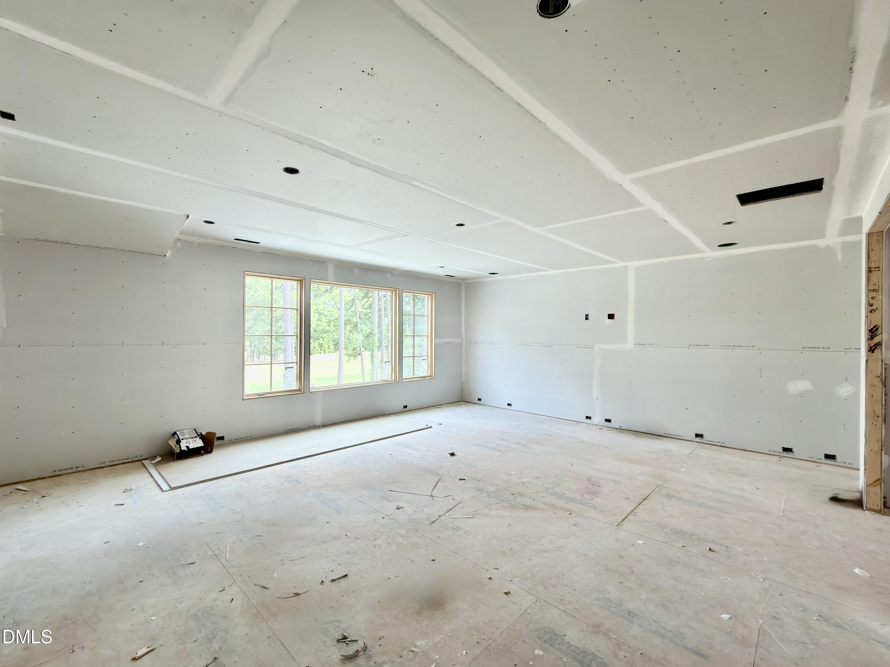 7136 North Ridge Drive Raleigh, NC 27615 - Photo 48 of 68 a view of an empty room with a window