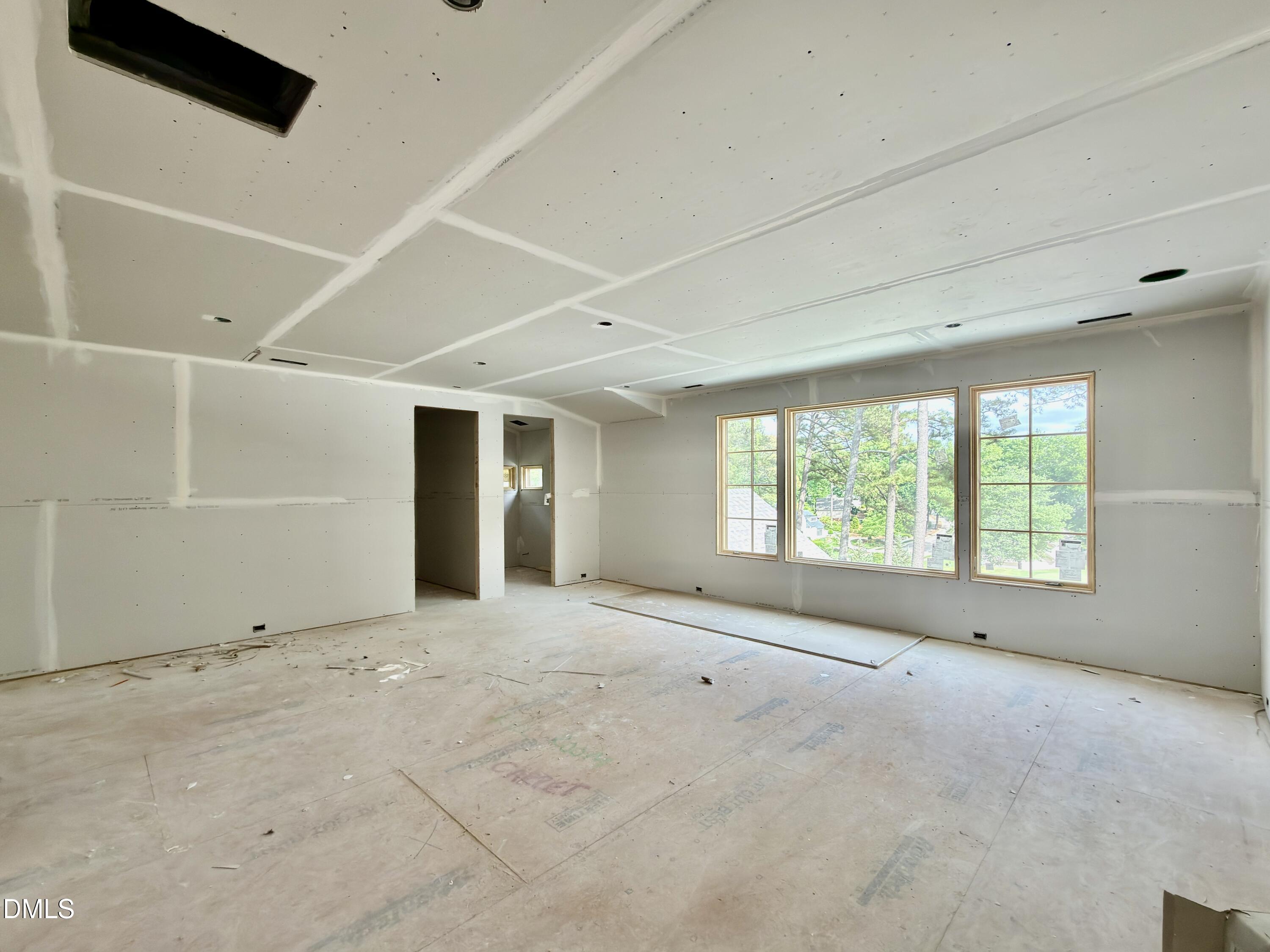 7136 North Ridge Drive Raleigh, NC 27615 - Photo 49 of 68 a view of an empty room with a window