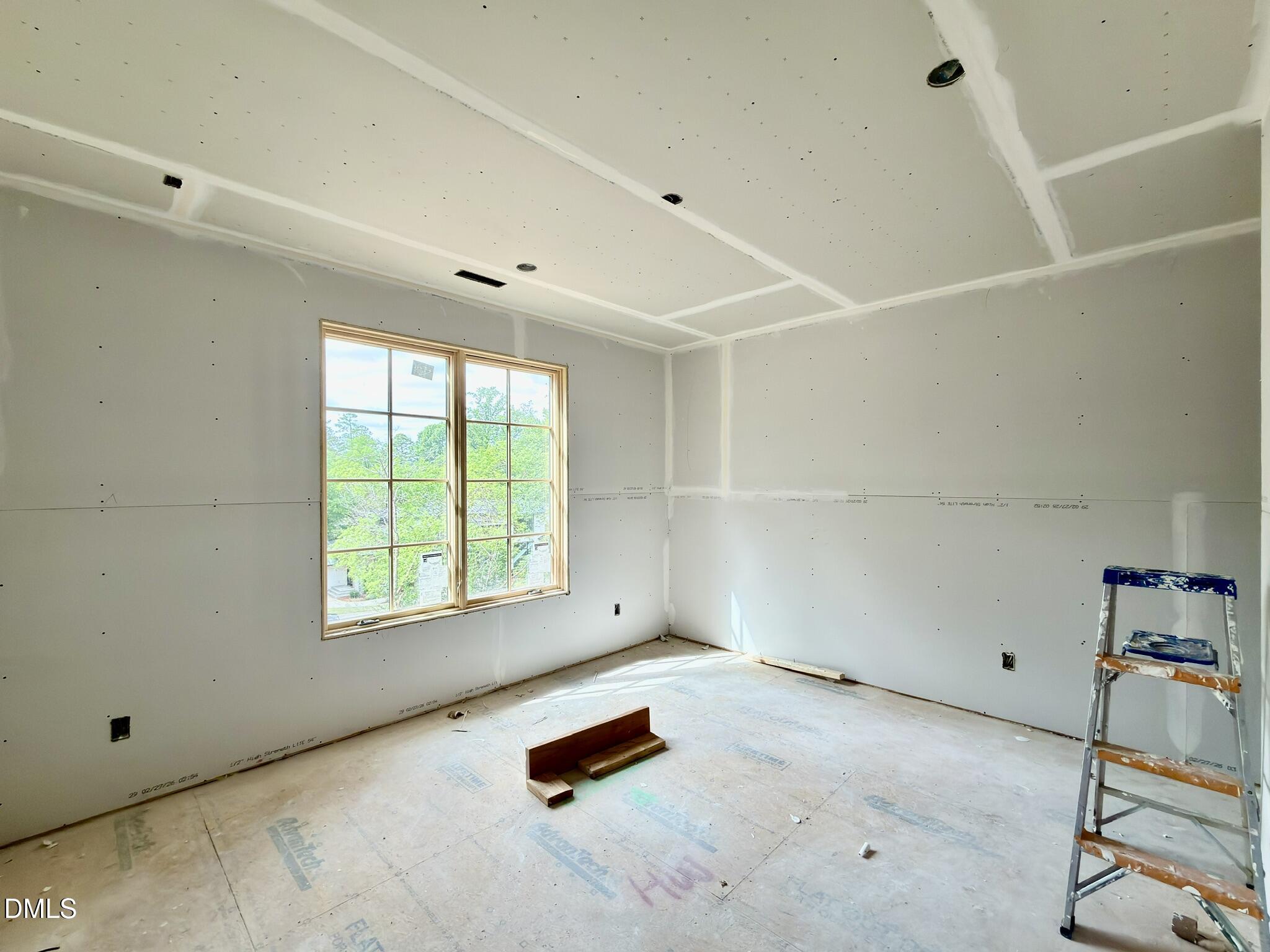 7136 North Ridge Drive Raleigh, NC 27615 - Photo 50 of 68 a room with furniture and a window