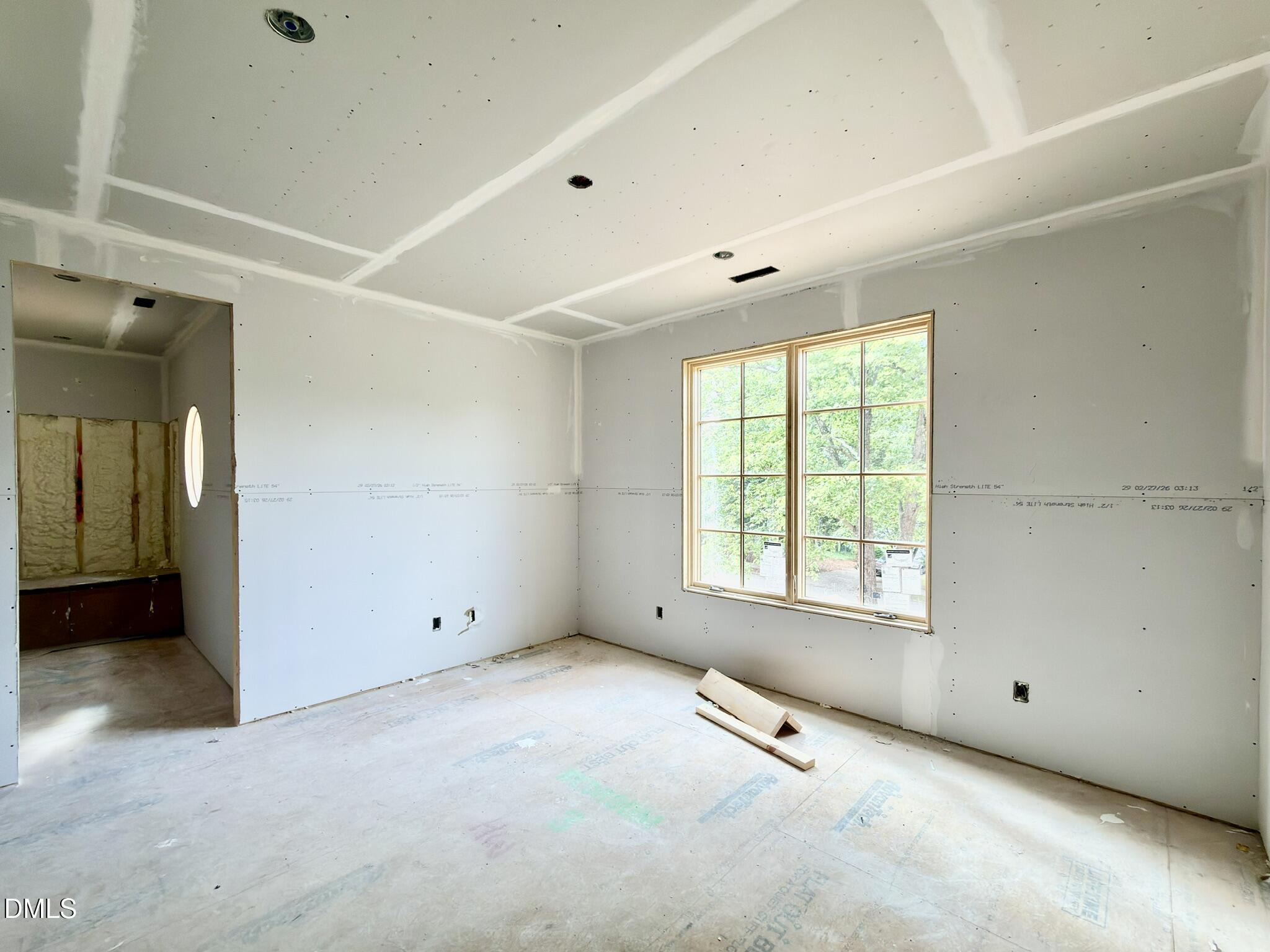 7136 North Ridge Drive Raleigh, NC 27615 - Photo 52 of 68 a view of an empty room with a window