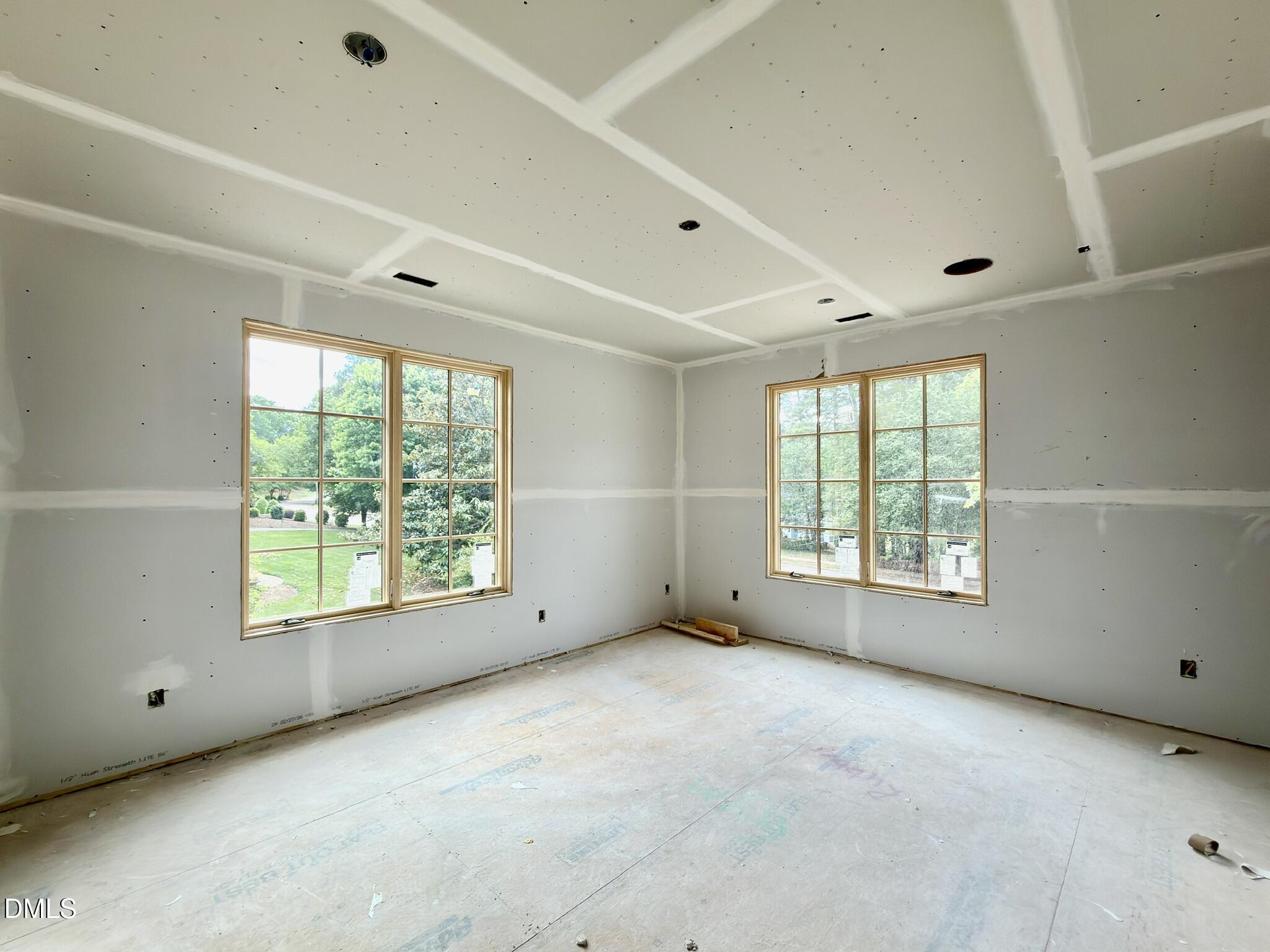 7136 North Ridge Drive Raleigh, NC 27615 - Photo 54 of 68 a view of an empty room with a window