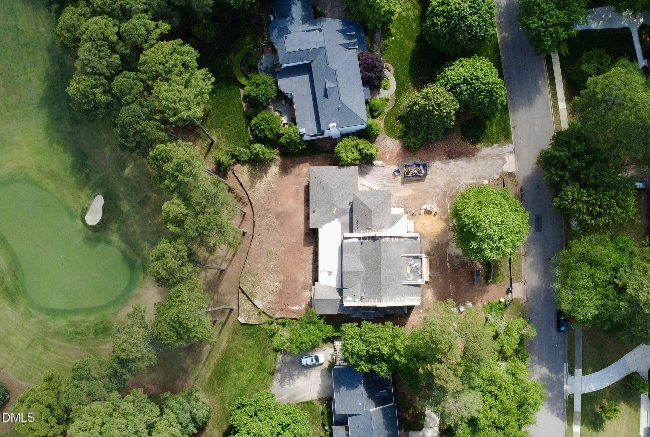 7136 North Ridge Drive Raleigh, NC 27615 - Photo 59 of 68 an aerial view of residential house with outdoor space and trees all around