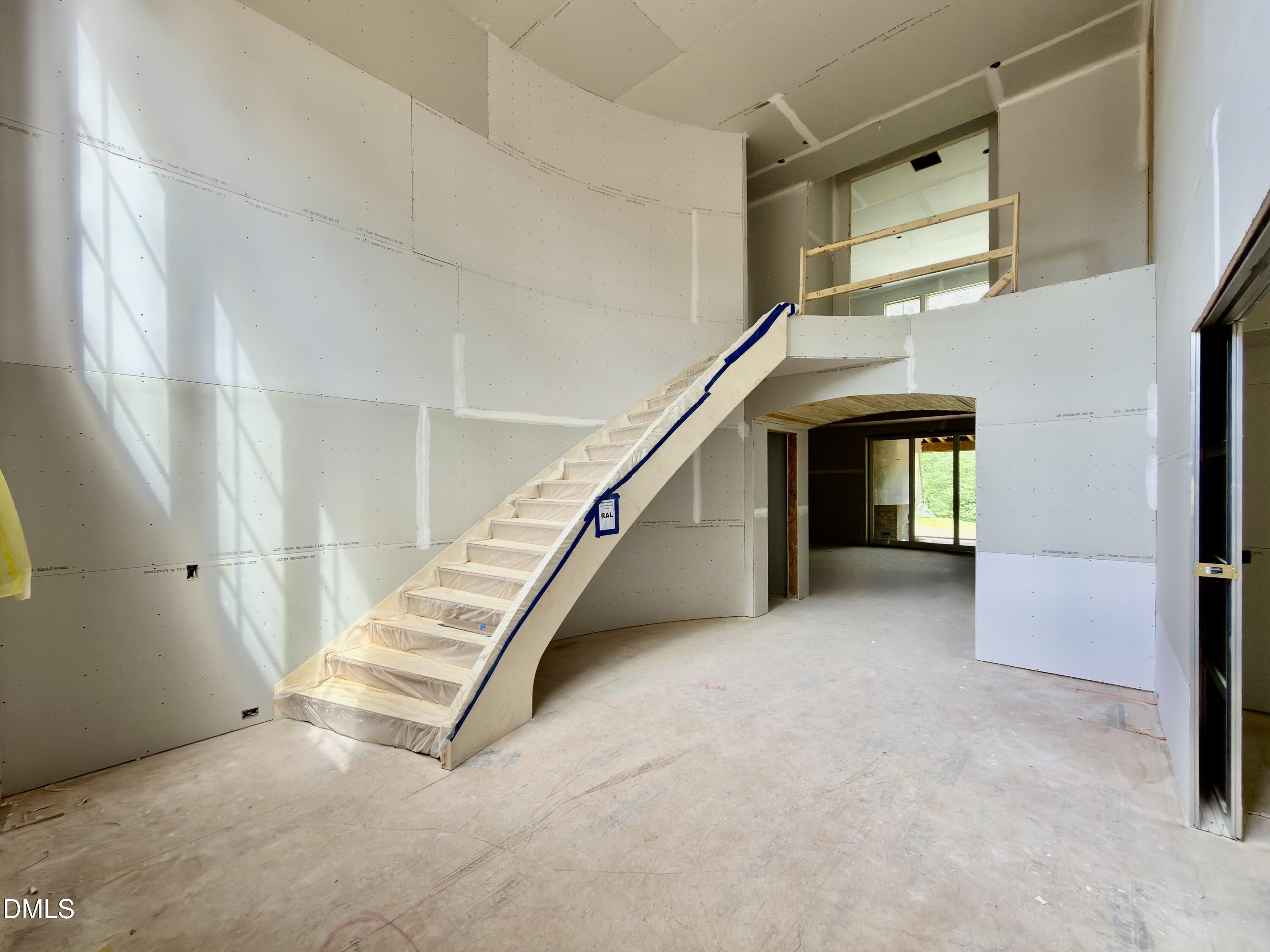 7136 North Ridge Drive Raleigh, NC 27615 - Photo 9 of 68 a view of an entryway with stairs