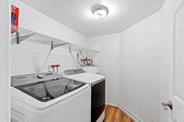 a kitchen that has a sink and a stove in it