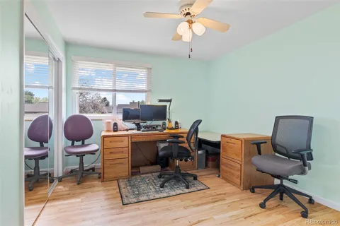 a view of a workspace with furniture