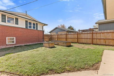 a view of a backyard with a garden