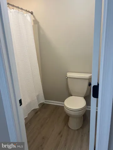 a view of deck with flat screen tv and stairs