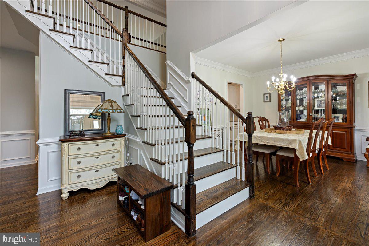 10 Eagleton Farm Road Newtown, PA 18940 - Photo 2 of 39 a view of a livingroom with furniture stairs and a chandelier