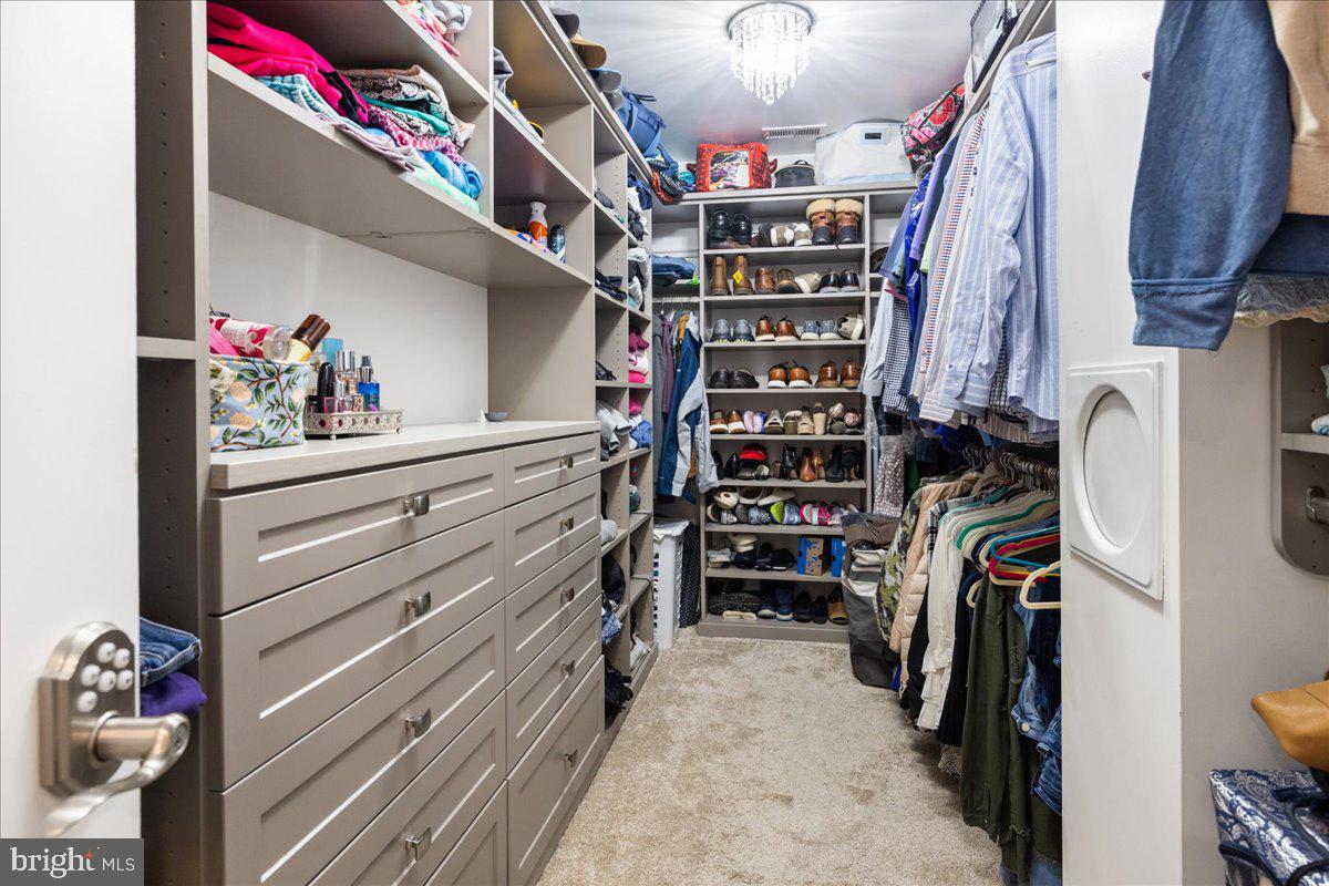 10 Eagleton Farm Road Newtown, PA 18940 - Photo 23 of 39 a view of walk in closet with clothes and shoes