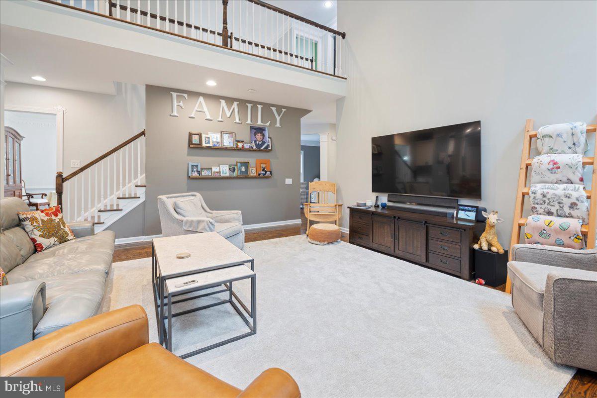 10 Eagleton Farm Road Newtown, PA 18940 - Photo 8 of 39 a living room with furniture and a flat screen tv
