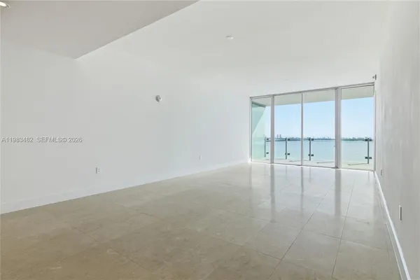 an empty room with natural light