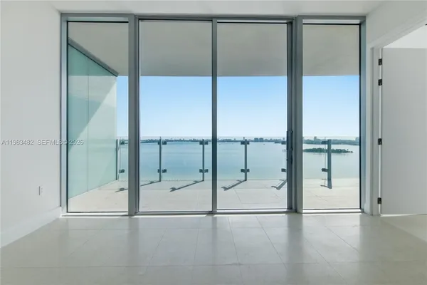 a view of an empty room with window