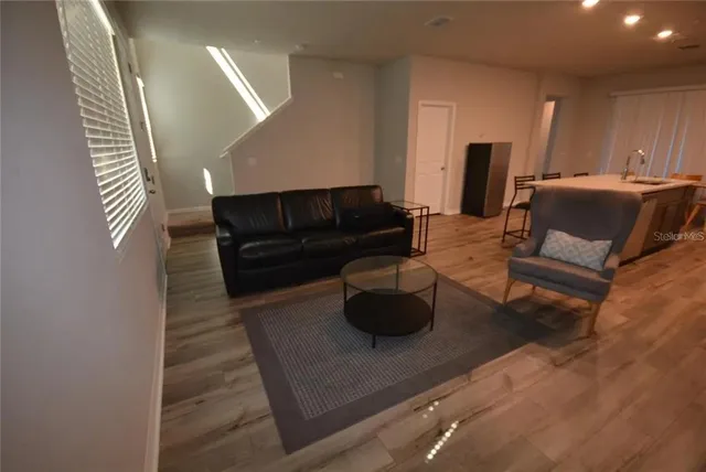 a living room with furniture and a couch