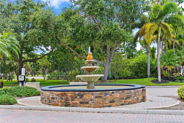 an aerial view of a house with a swimming pool