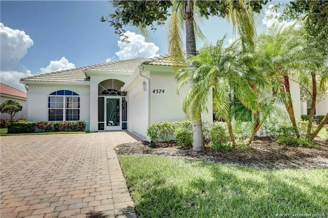 a view of a garden and basketball court