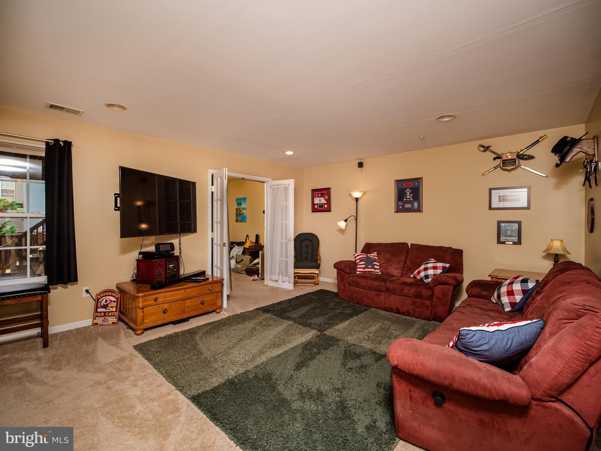 1008 Railbed Drive Odenton, MD 21113 - Photo 14 of 37 Lower level family room adjacent to den