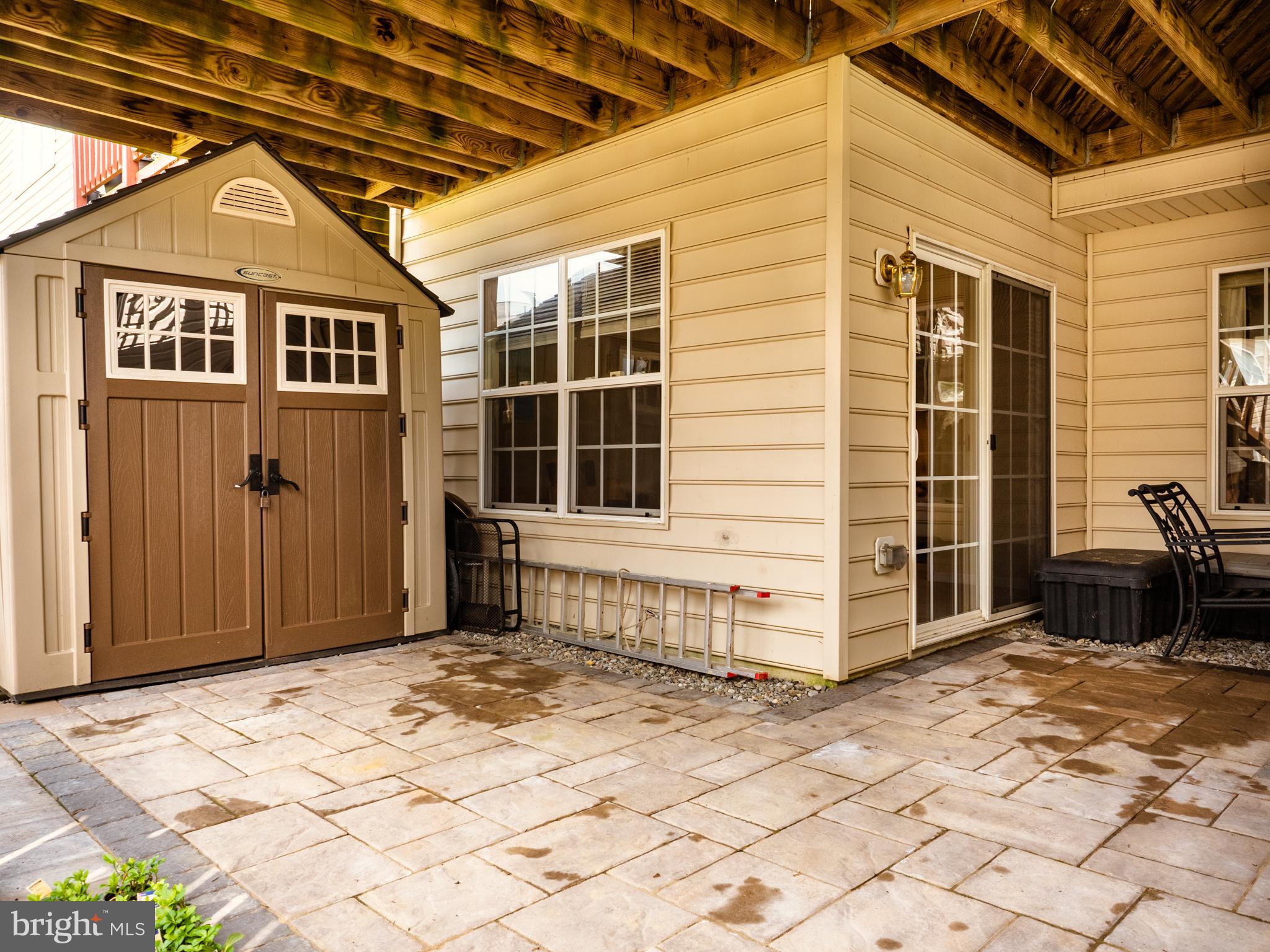 1008 Railbed Drive Odenton, MD 21113 - Photo 30 of 37 Storage shed and patio off the den