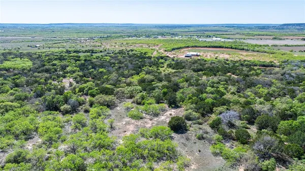 a view of an ocean and a mountain