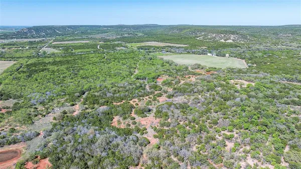 a view of city with ocean
