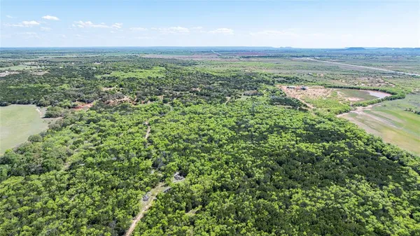 a view of a city with an ocean