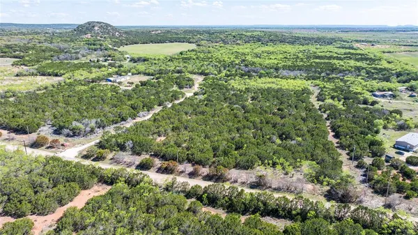 a view of a lake with a mountain in the background