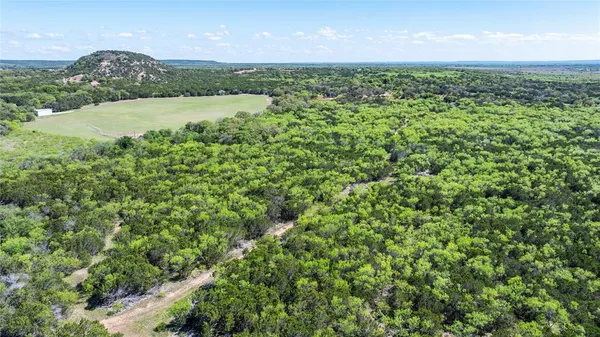 a view of a lush green field