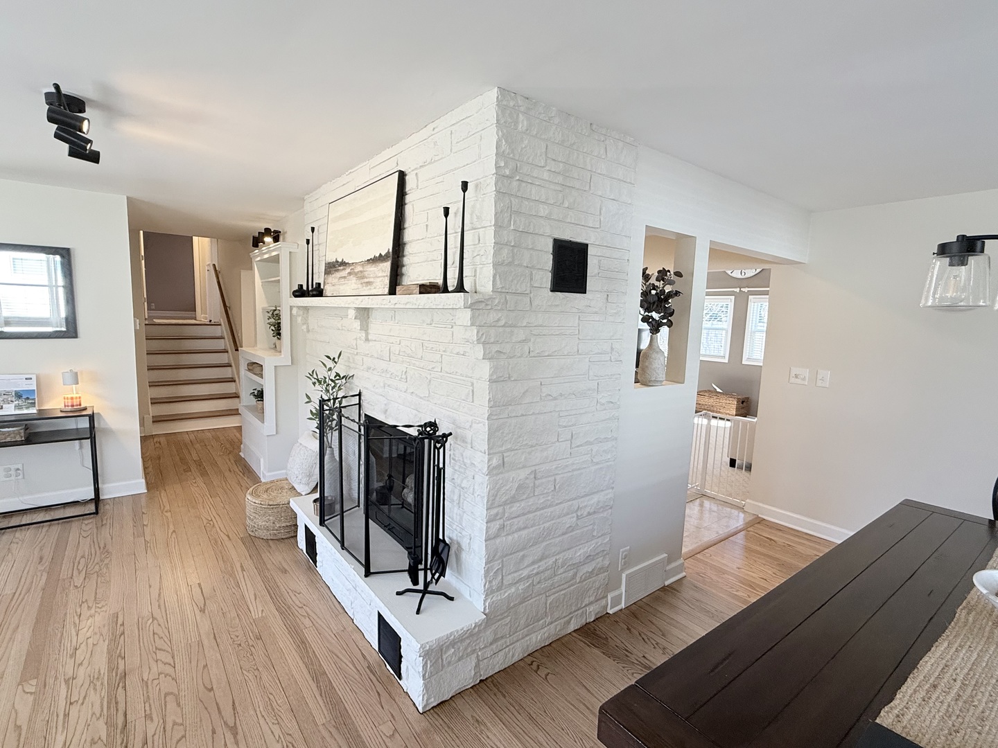 515 Roberts Lane Batavia, IL 60510 - Photo 15 of 42 a living room with furniture wooden floor and a fireplace