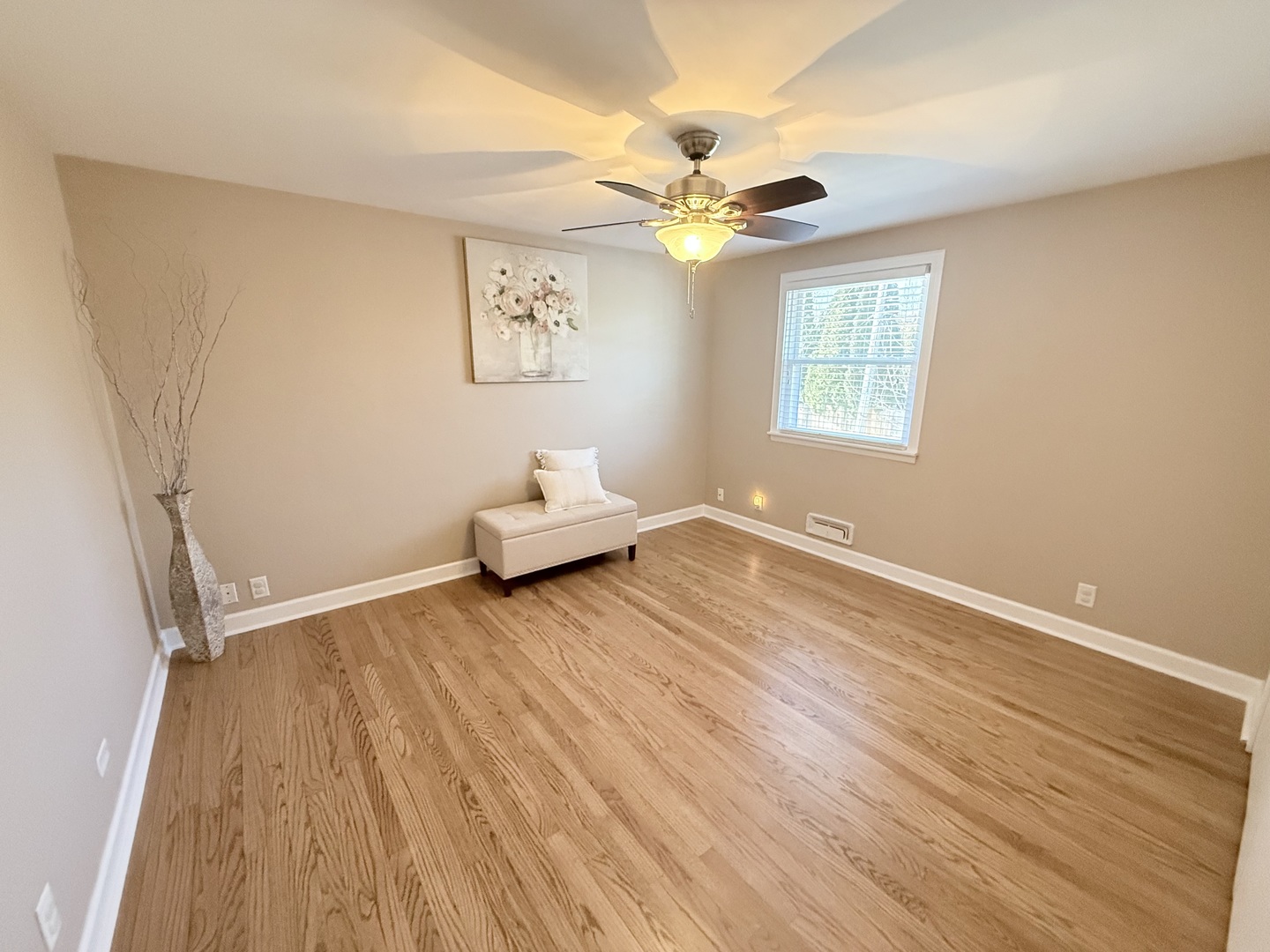 515 Roberts Lane Batavia, IL 60510 - Photo 26 of 42 wooden floor in an empty room with a window