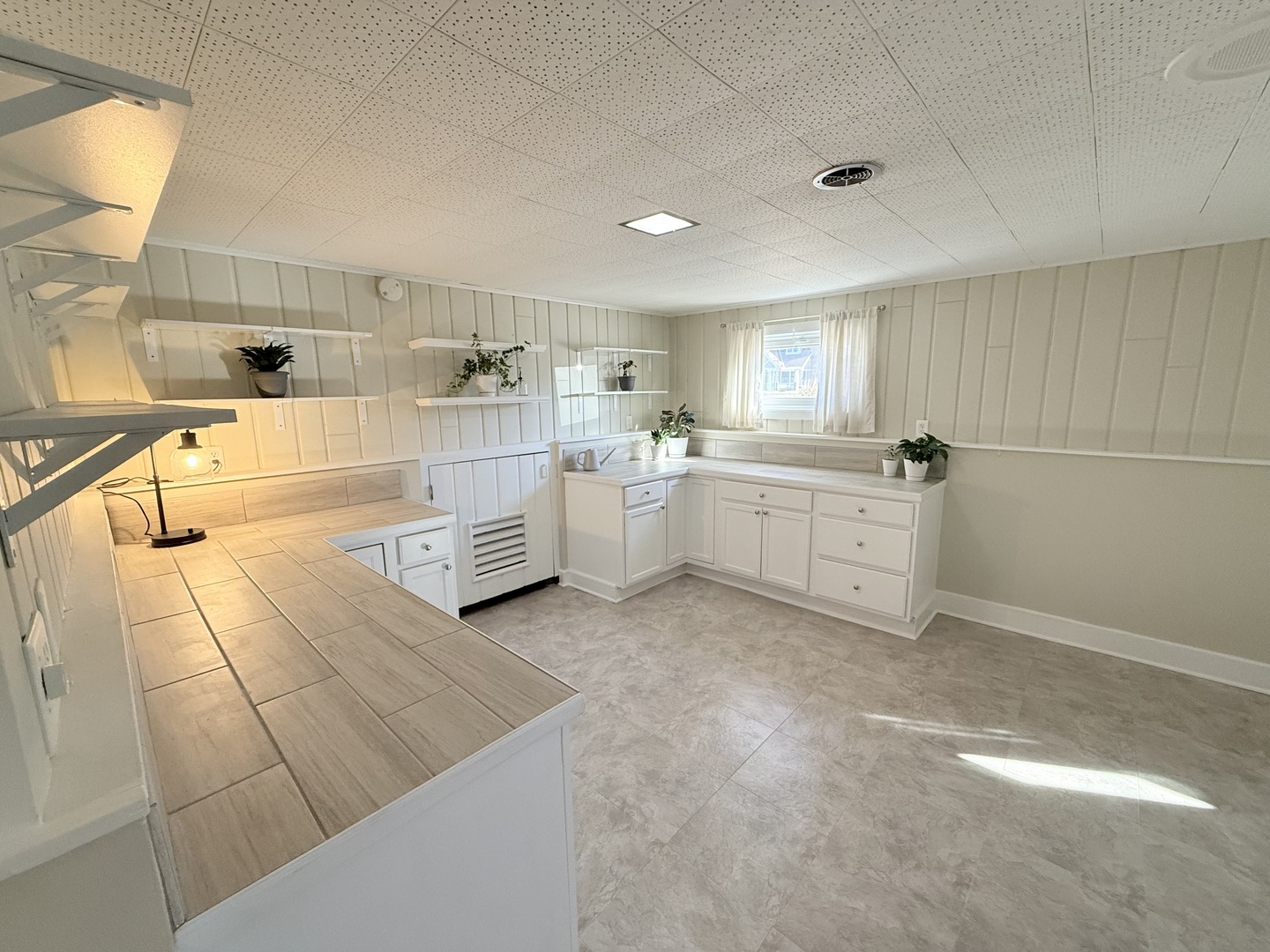 515 Roberts Lane Batavia, IL 60510 - Photo 34 of 42 a large white kitchen with a stove a sink dishwasher and cabinets