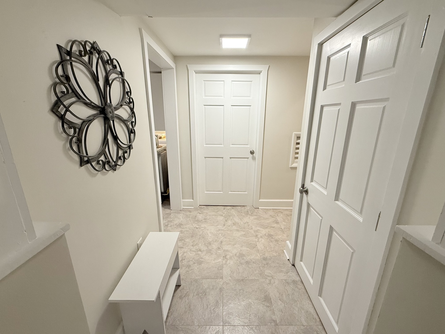 515 Roberts Lane Batavia, IL 60510 - Photo 41 of 42 a view of a hallway with wooden floor and closet