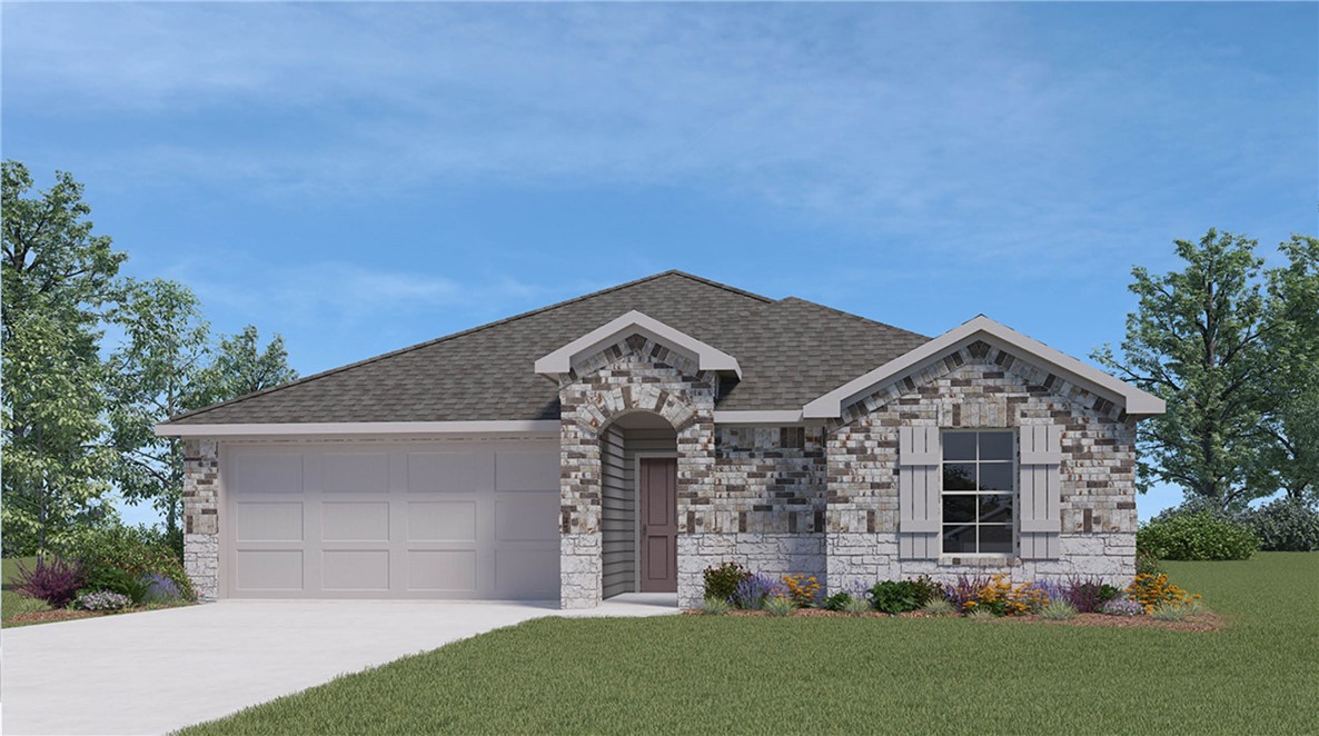 front view of a house with a yard