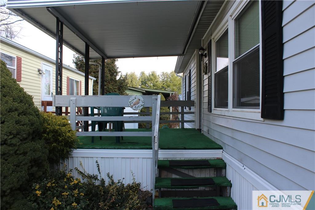5 Poe Road North Brunswick, NJ 08902 - Photo 2 of 10 a view of a house with a yard