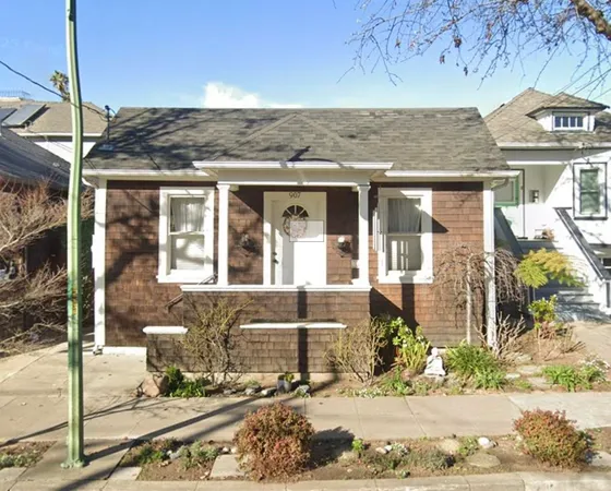 a front view of a house with street