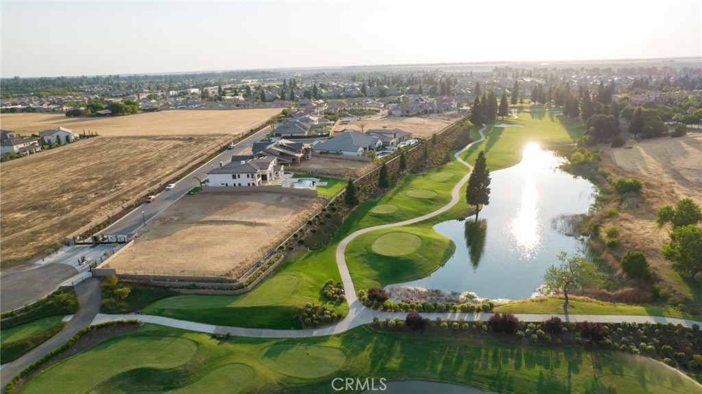2490 East Copper Ridge Drive Fresno, CA 93730 - Photo 17 of 20 an aerial view of residential houses with outdoor space and river