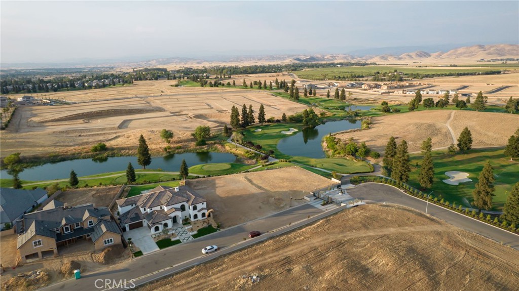 2490 East Copper Ridge Drive Fresno, CA 93730 - Photo 4 of 20 an aerial view of a city