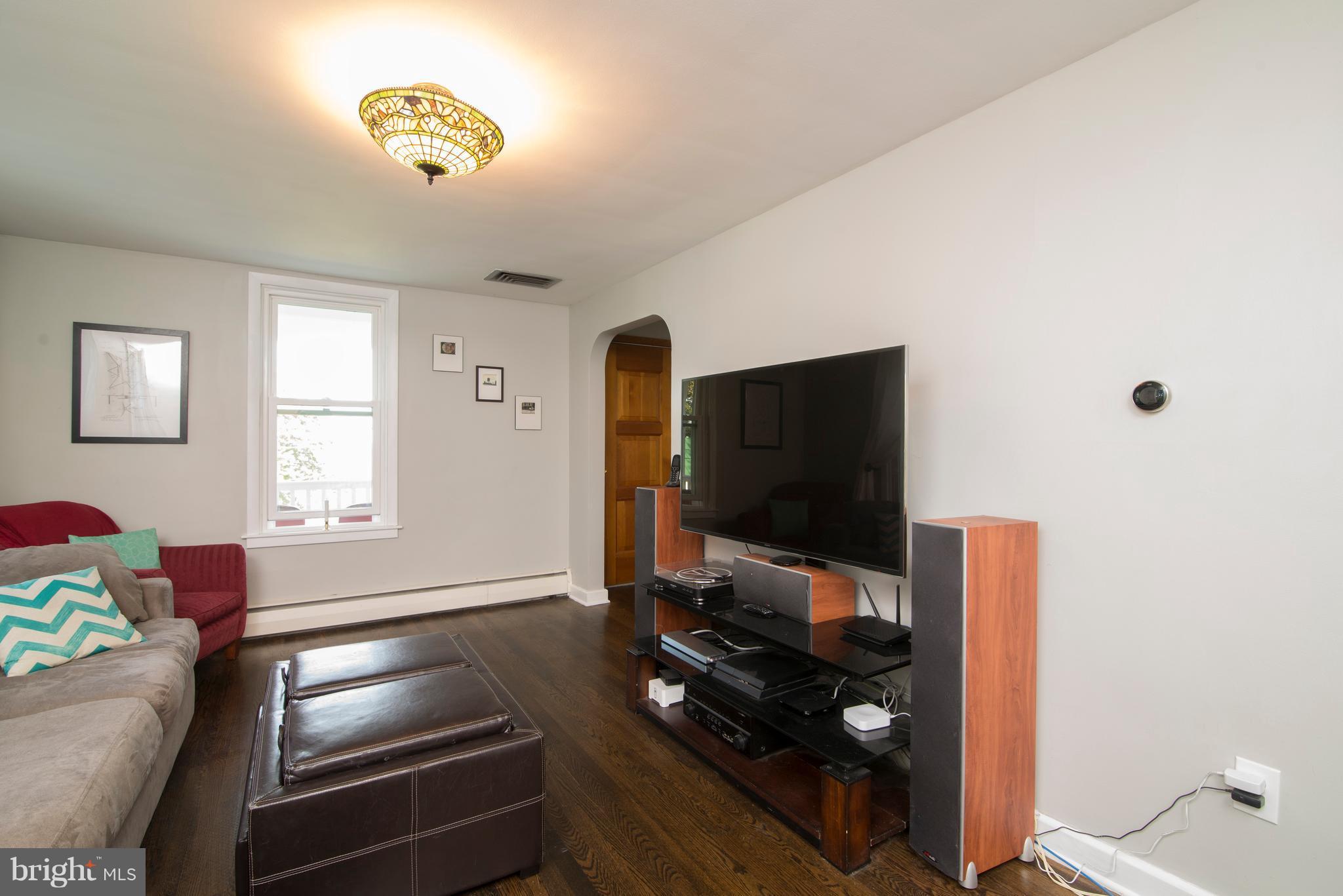 6227 Clevelandtown Road Boonsboro, MD 21713 - Photo 8 of 30 a room with furniture and flat screen tv