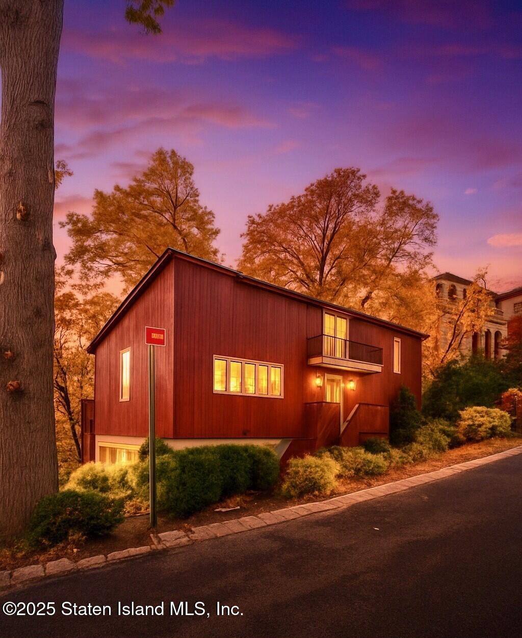 20 Signal Hill Road Staten Island, NY 10301 - Photo 40 of 42 a front view of a house with a yard